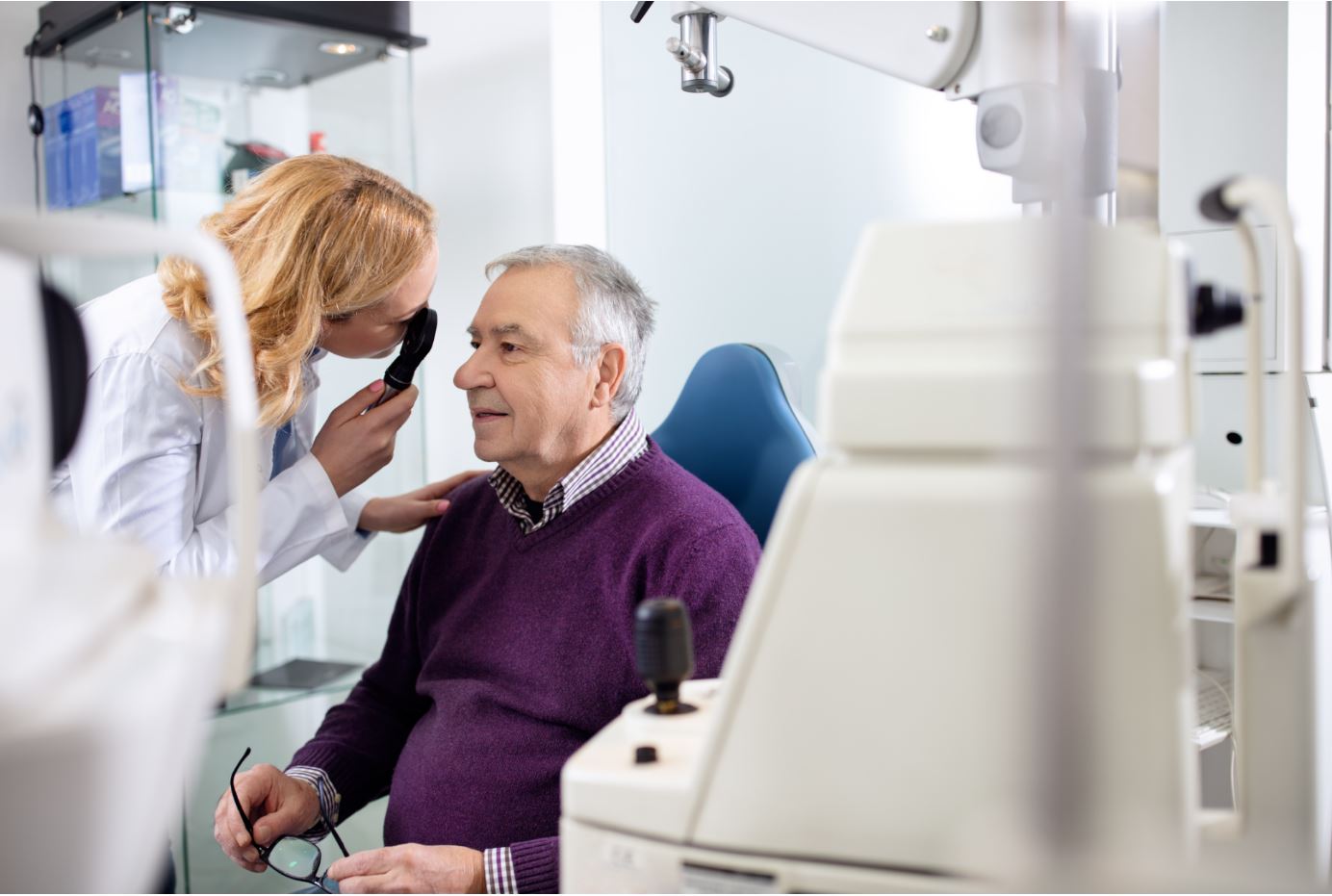 Older man receiving an eye exam for diabetic eye disease