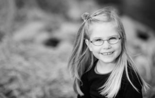 Cute little girl wearing glasses