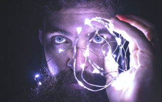 Image of man holding lights
