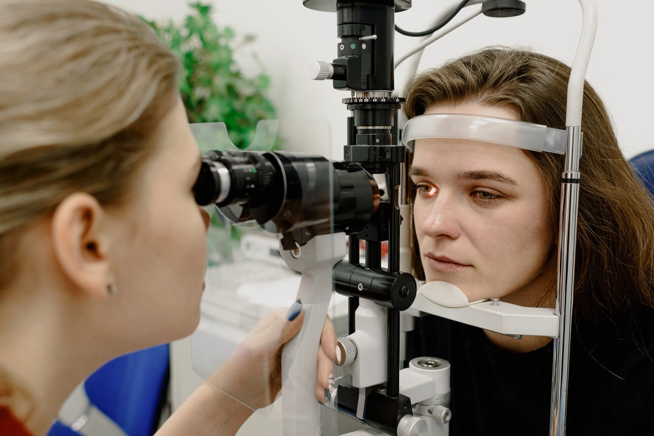 image of woman during eye exam for poor eyesight