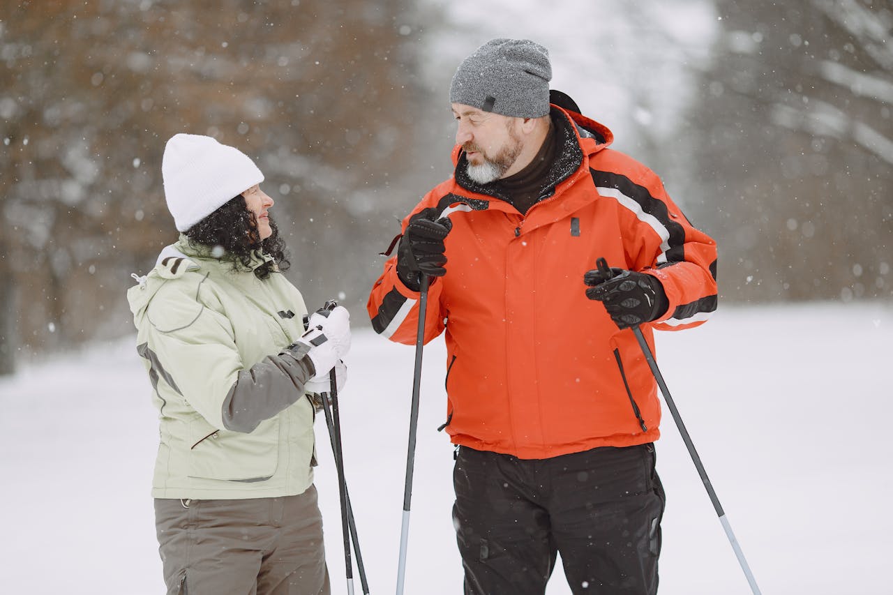 mature couple skiing 