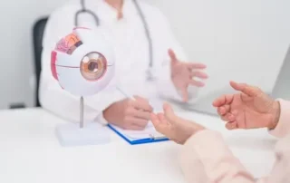 elderly patient in consultation with eye care professional