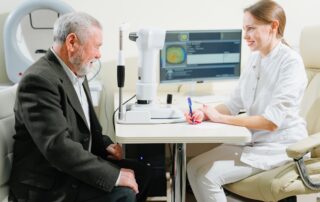 Senior patient speaking with ophthalmologist